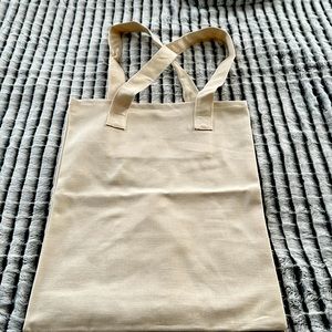 Blank tote bag with inside button snap pocket
